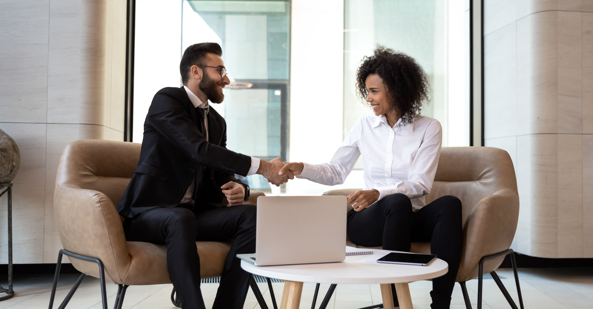 two people shaking hands